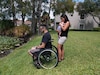 Valerie Pitaluga with baby Julian and her husband, Danny Pitaluga, near a pond outside their apartment in Plantation, Fla. on June 11.